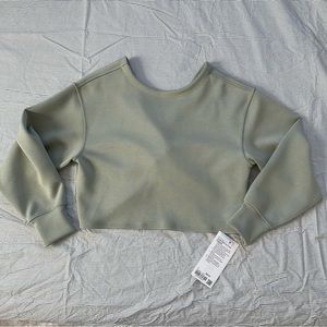 Twist back to front pullover